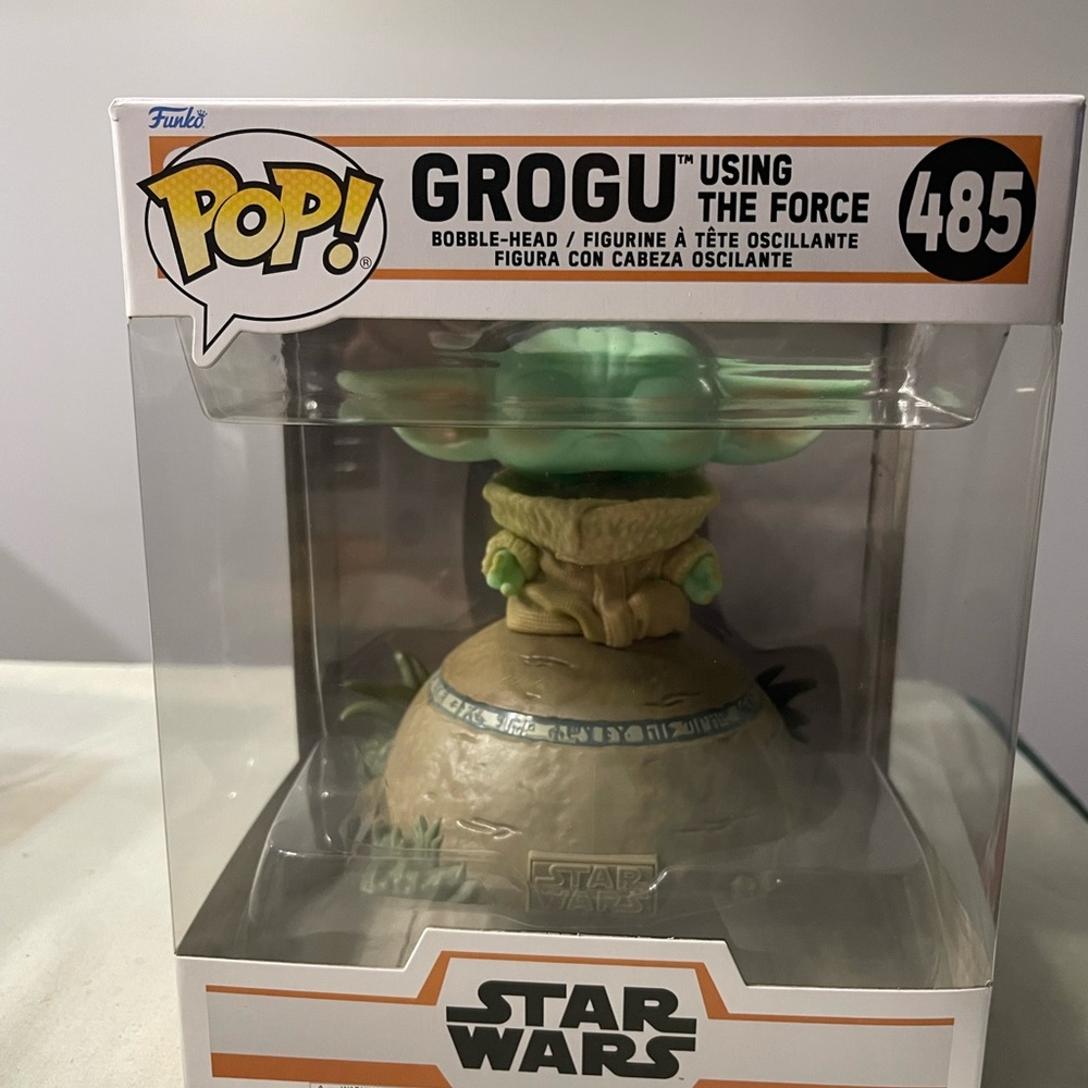 Star Wars 
Funko Pops 
Grogu Using the Force #485